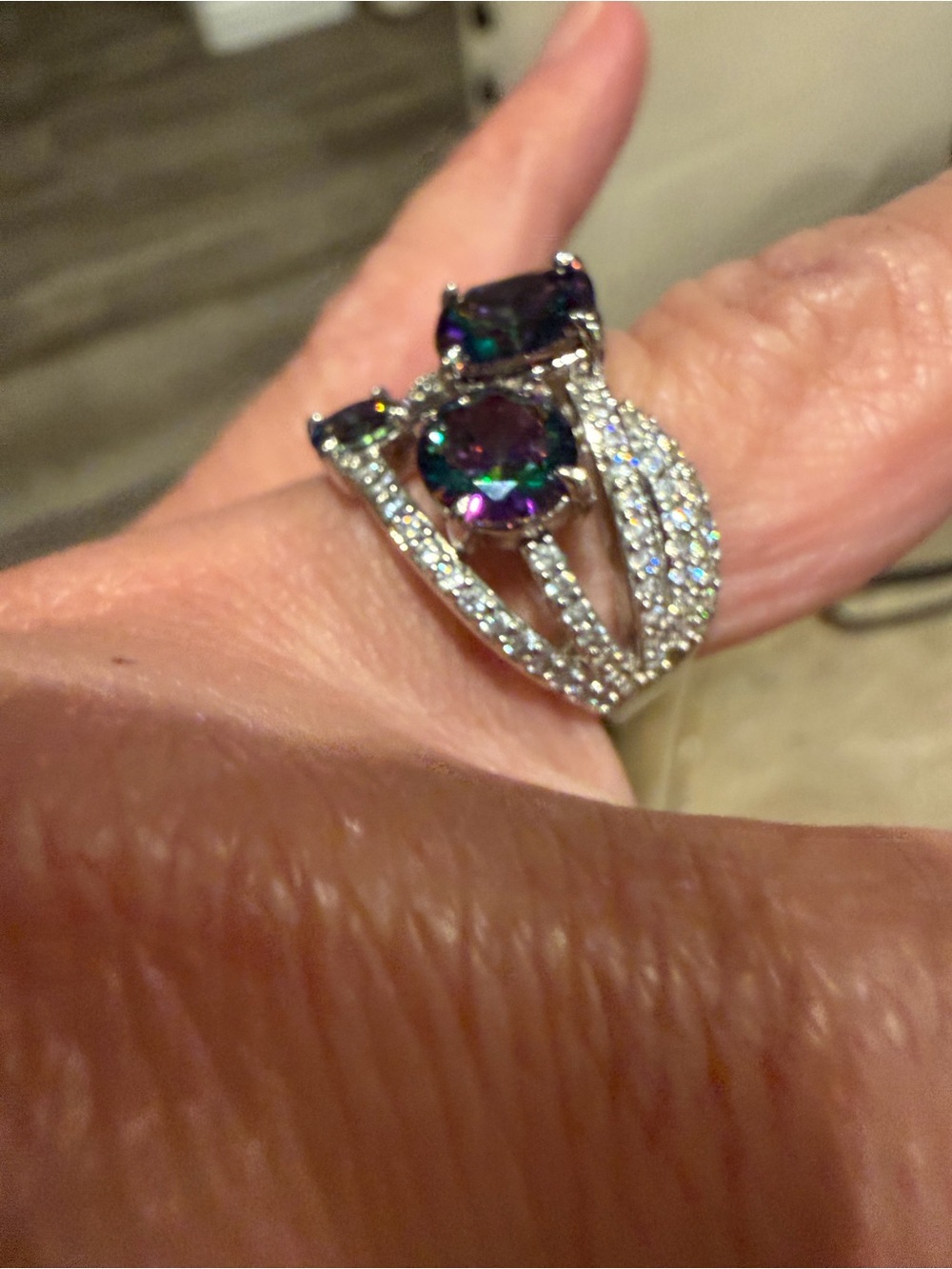 Silver-Tone Ring with Iridescent Green-Blue Gemstones